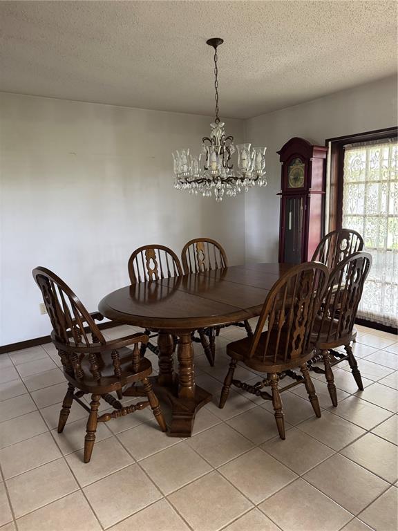 4106 Old Mulberry Road Plant City, FL 33567 - Photo 44 of 52 a view of a dining room with furniture and chandelier