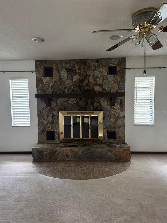4106 Old Mulberry Road Plant City, FL 33567 - Photo 45 of 52 a living room with furniture and a fireplace