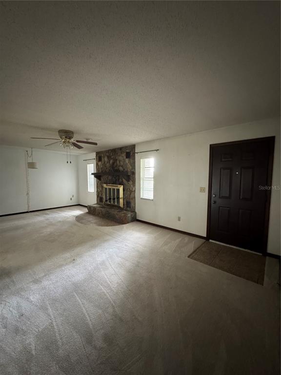 4106 Old Mulberry Road Plant City, FL 33567 - Photo 46 of 52 a view of empty room with window and fireplace