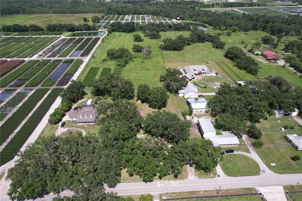 4106 Old Mulberry Road Plant City, FL 33567 - Photo 51 of 52 an aerial view of residential houses with outdoor space