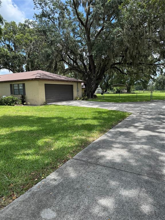 4106 Old Mulberry Road Plant City, FL 33567 - Photo 6 of 52 a view of a house with a yard