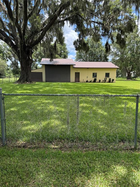 4106 Old Mulberry Road Plant City, FL 33567 - Photo 8 of 52 a front view of house with yard and green space