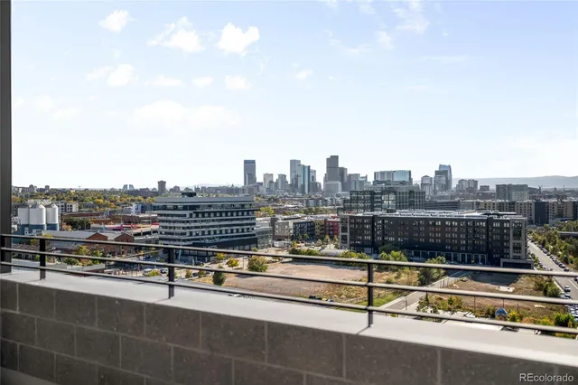 a view of swimming pool with a chairs