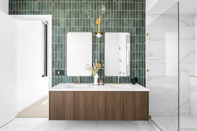 a white bath tub sitting next to a white sink