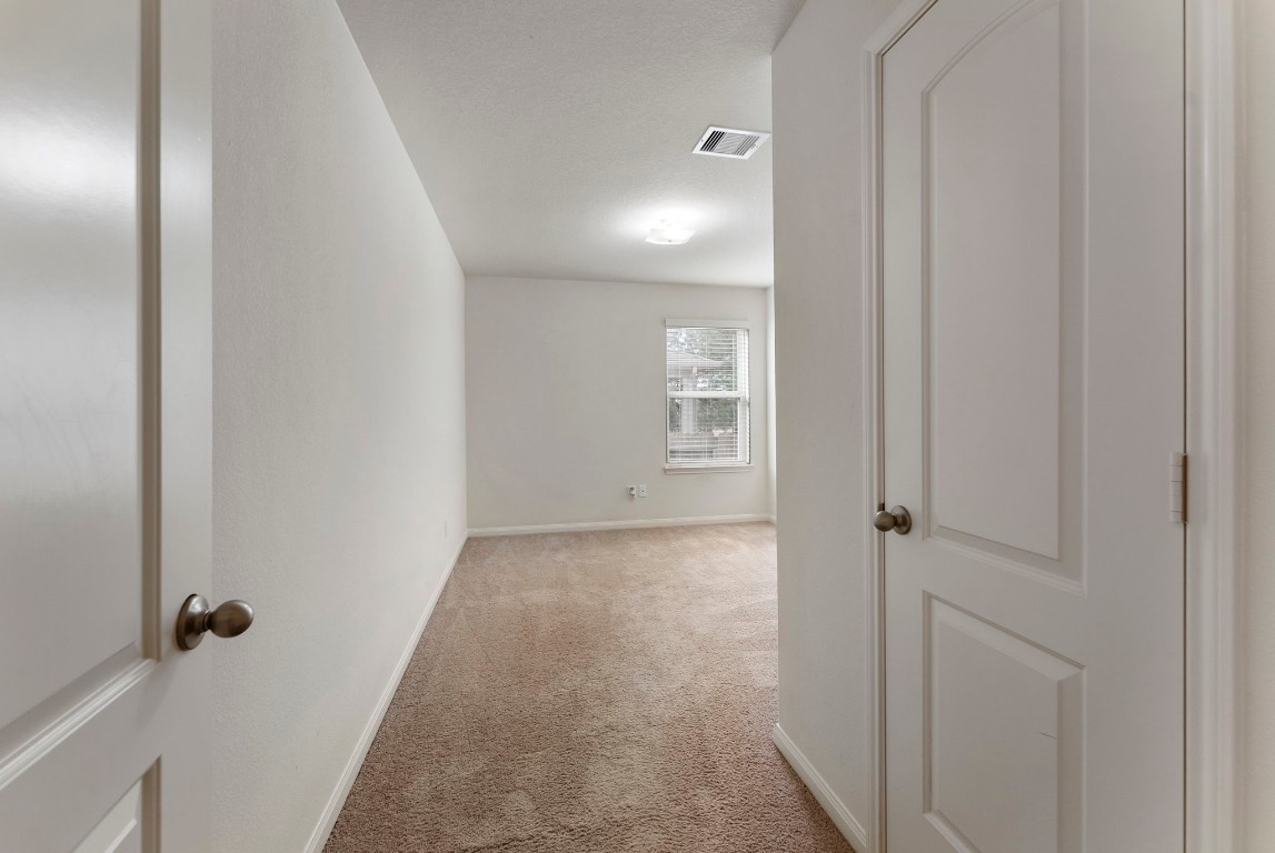 9159 Nina Road Conroe, TX 77304 - Photo 14 of 24 Secondary bedroom
