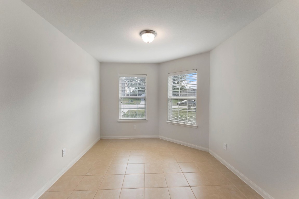 9159 Nina Road Conroe, TX 77304 - Photo 8 of 24 Great space for breakfast table and lots of natural light.