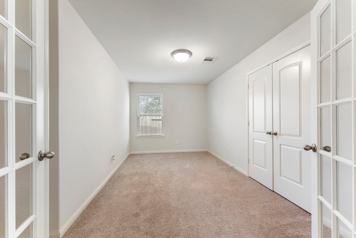 9159 Nina Road Conroe, TX 77304 - Photo 9 of 24 Home study offers privacy with double doors.