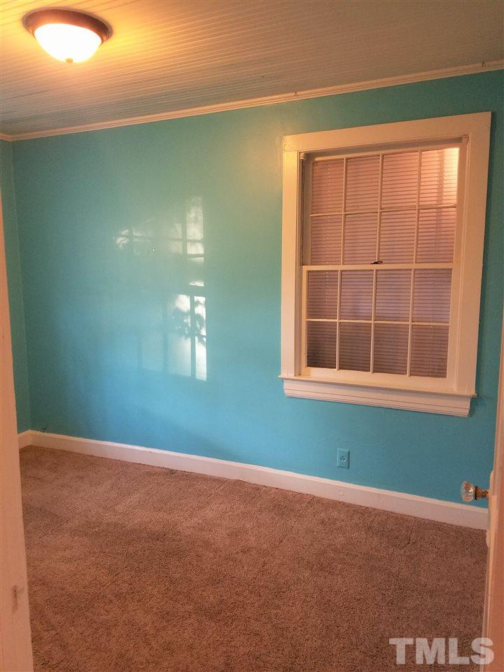 3105 East Garner Road Raleigh, NC 27610 - Photo 11 of 18 a view of an empty room with a window