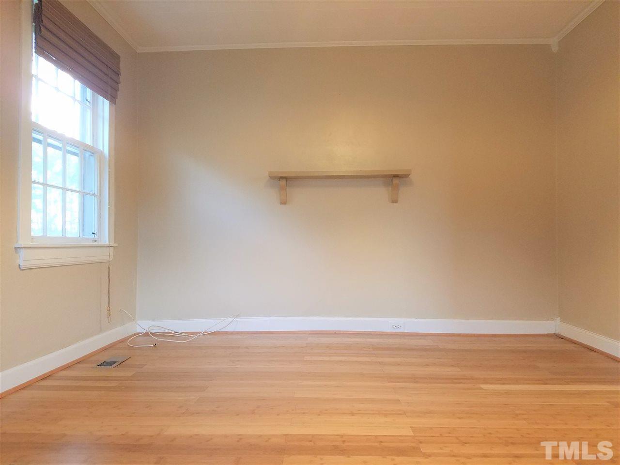 3105 East Garner Road Raleigh, NC 27610 - Photo 5 of 18 a view of an empty room with window
