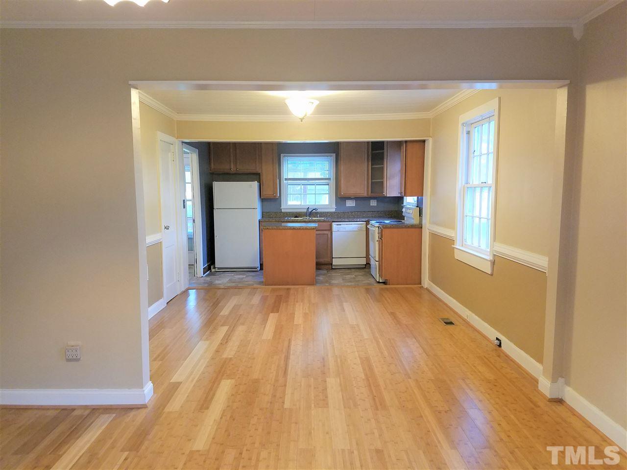 3105 East Garner Road Raleigh, NC 27610 - Photo 7 of 18 a view of a kitchen with a large window