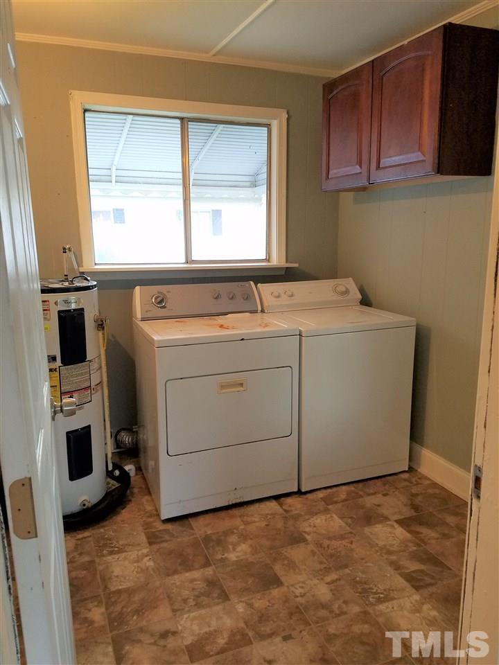 3105 East Garner Road Raleigh, NC 27610 - Photo 10 of 18 a utility room with dryer and washer