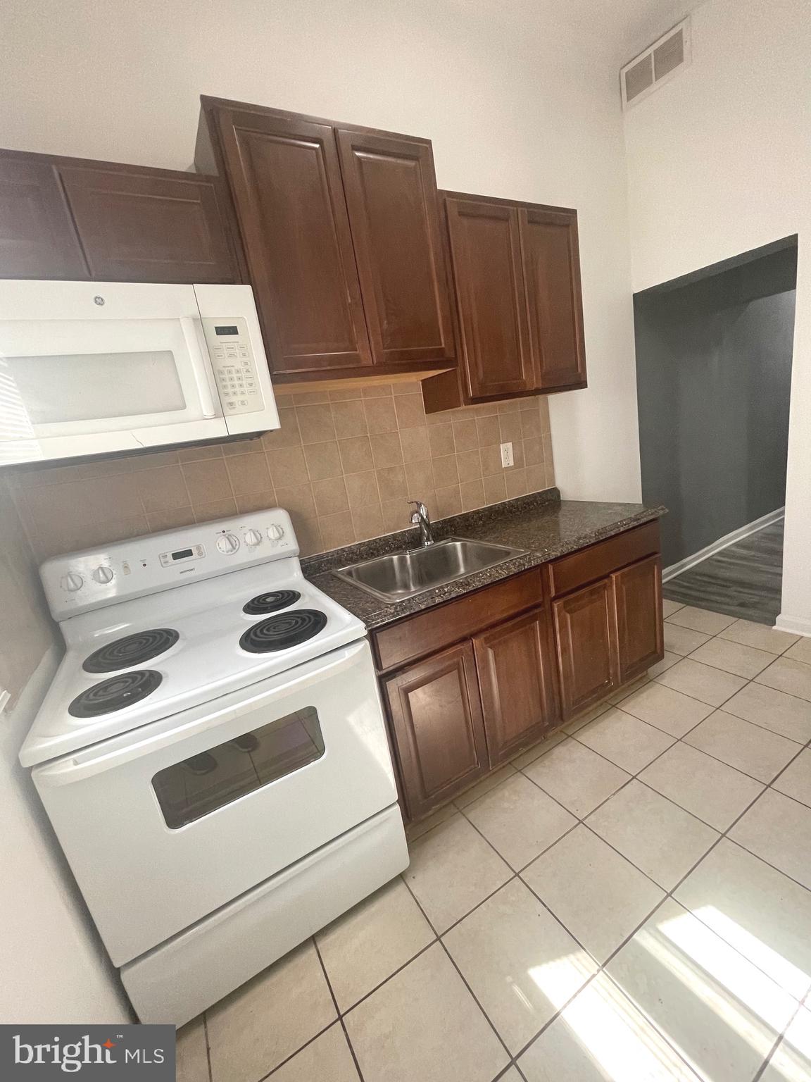 519 Mosher Street Baltimore, MD 21217 - Photo 2 of 4 Renovated Kitchen with soft closed cabinets