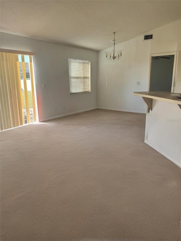 702 Tartan Loop Lake Wales, FL 33853 - Photo 4 of 20 a view of an empty room with a window
