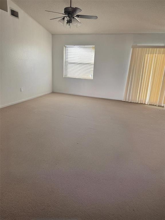 702 Tartan Loop Lake Wales, FL 33853 - Photo 5 of 20 an empty room with a window