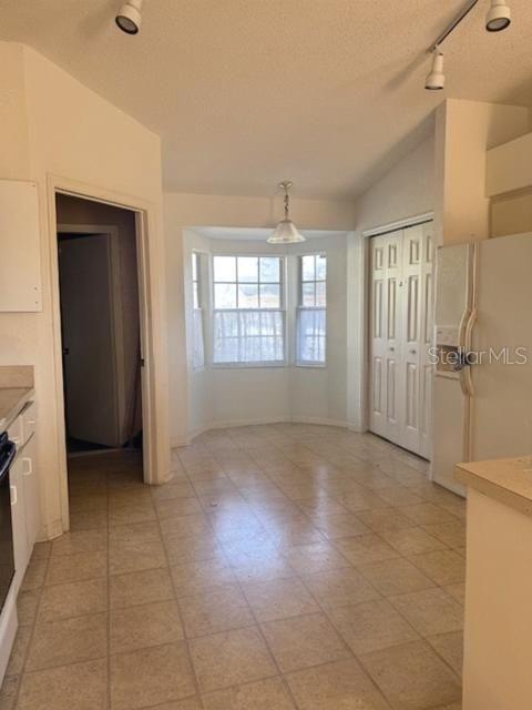 702 Tartan Loop Lake Wales, FL 33853 - Photo 6 of 20 a view of an empty room with a window