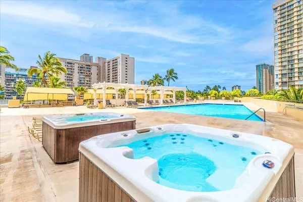 a view of a swimming pool and outdoor space