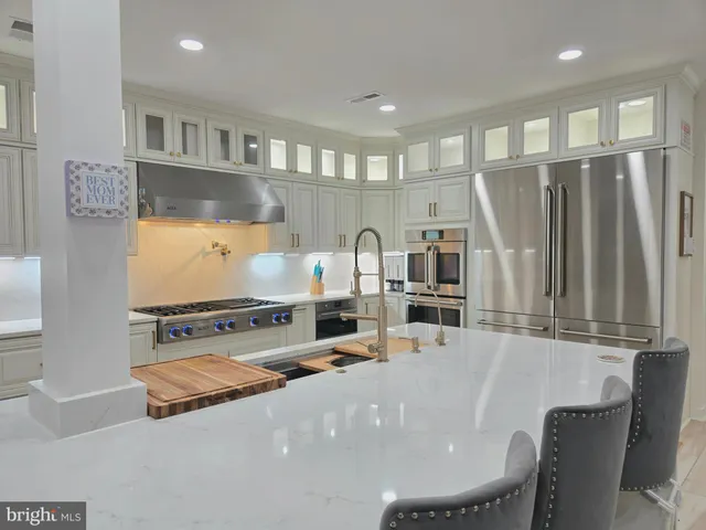 a room with furniture pool table and projector