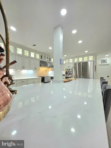 a view of a lobby with black carpet