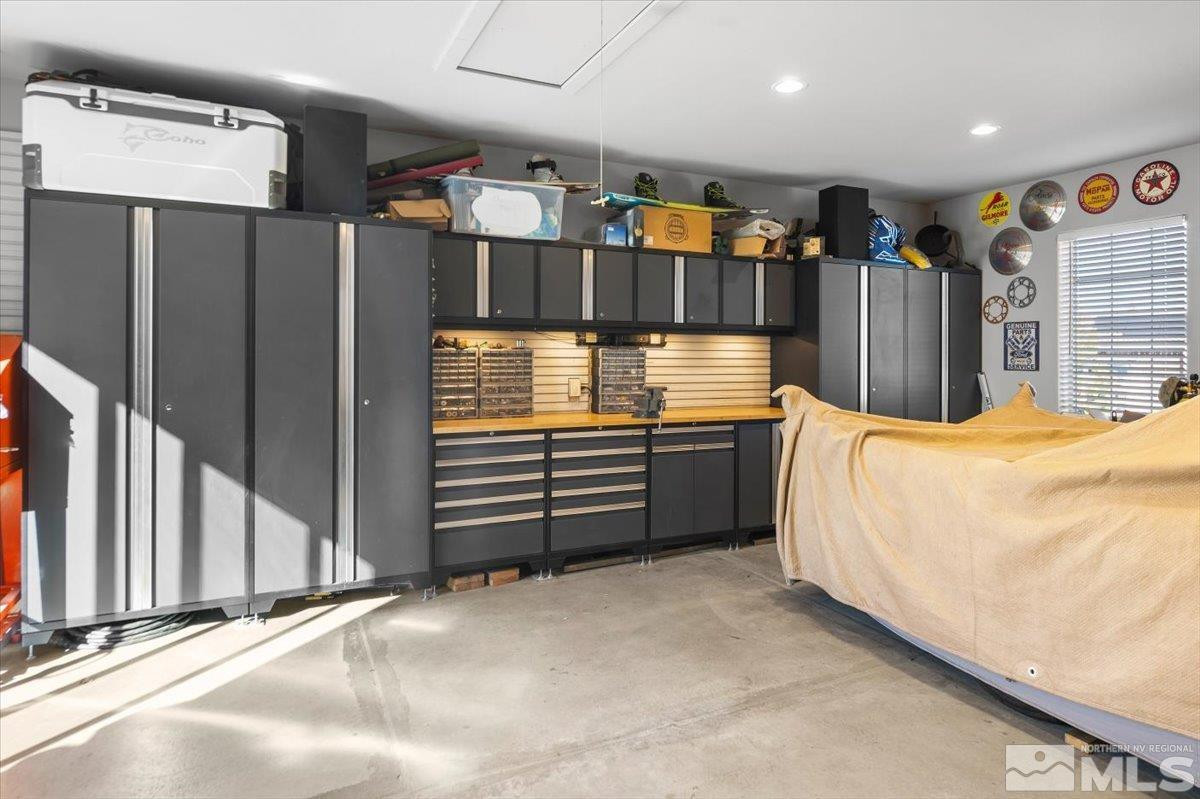 5720 Cevennes Court Reno, NV 89511 - Photo 32 of 40 a bed room with a bed and a large window