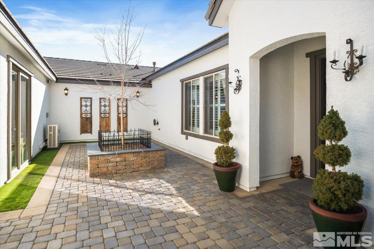 5720 Cevennes Court Reno, NV 89511 - Photo 5 of 40 a view of a entryway door of the house