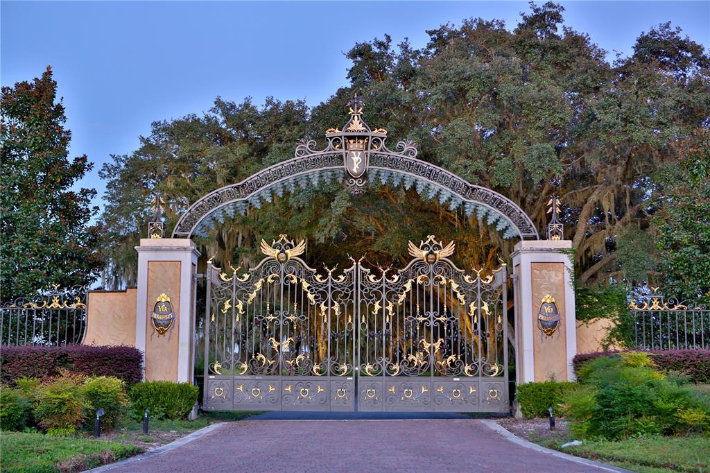0 Southeast 116th Pl Road Ocala, FL 34480 - Photo 2 of 7 a front view of a house with a garden