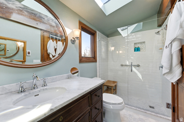 2635 Little Kate Road, Unit 21 Park City, UT 84060 - Photo 29 of 39 Bathroom with vanity, a shower stall, a skylight, and lofted ceiling