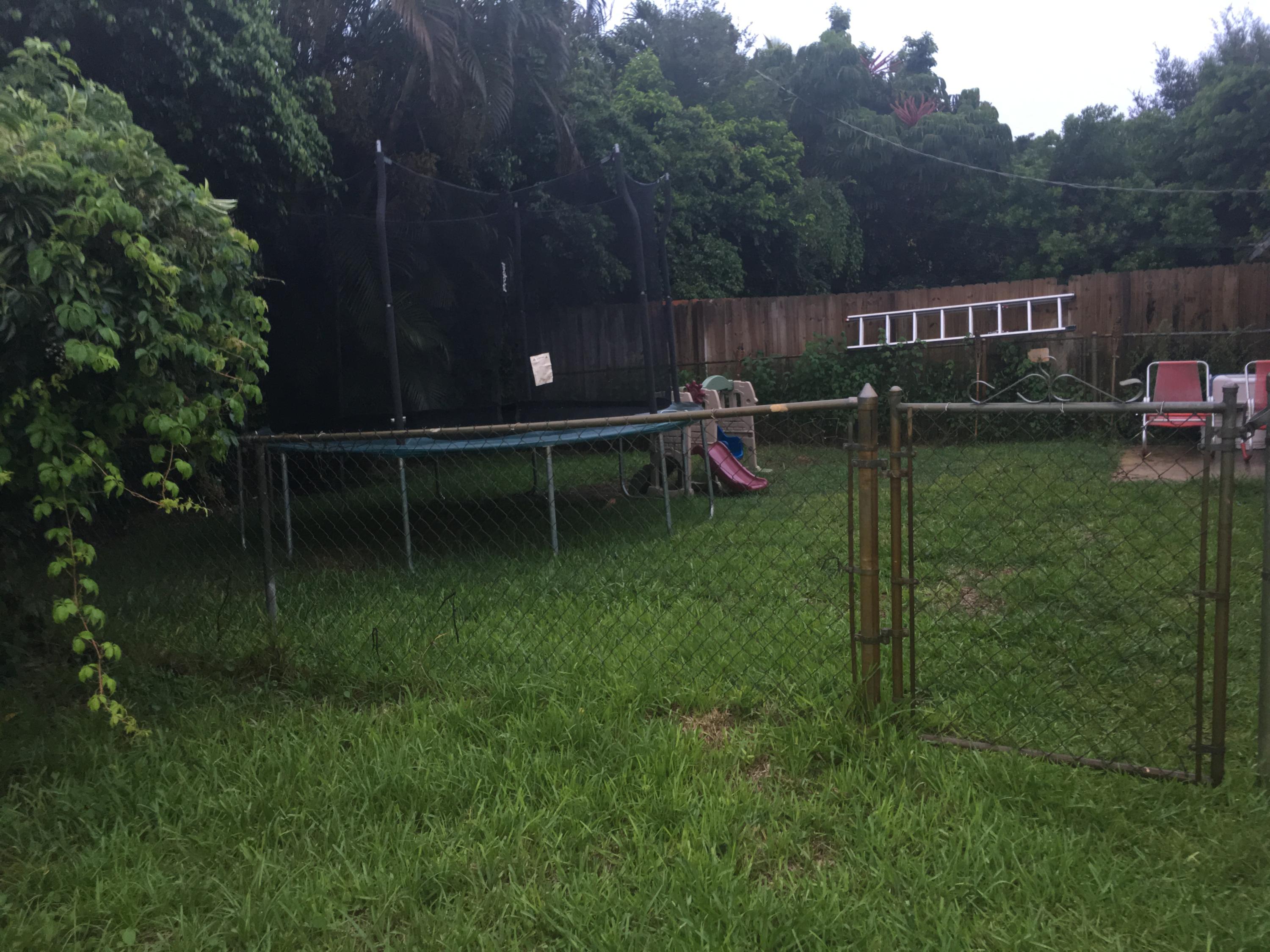 2441 Ranch House Road, Unit A West Palm Beach, FL 33406 - Photo 5 of 13 Fenced in backyard
