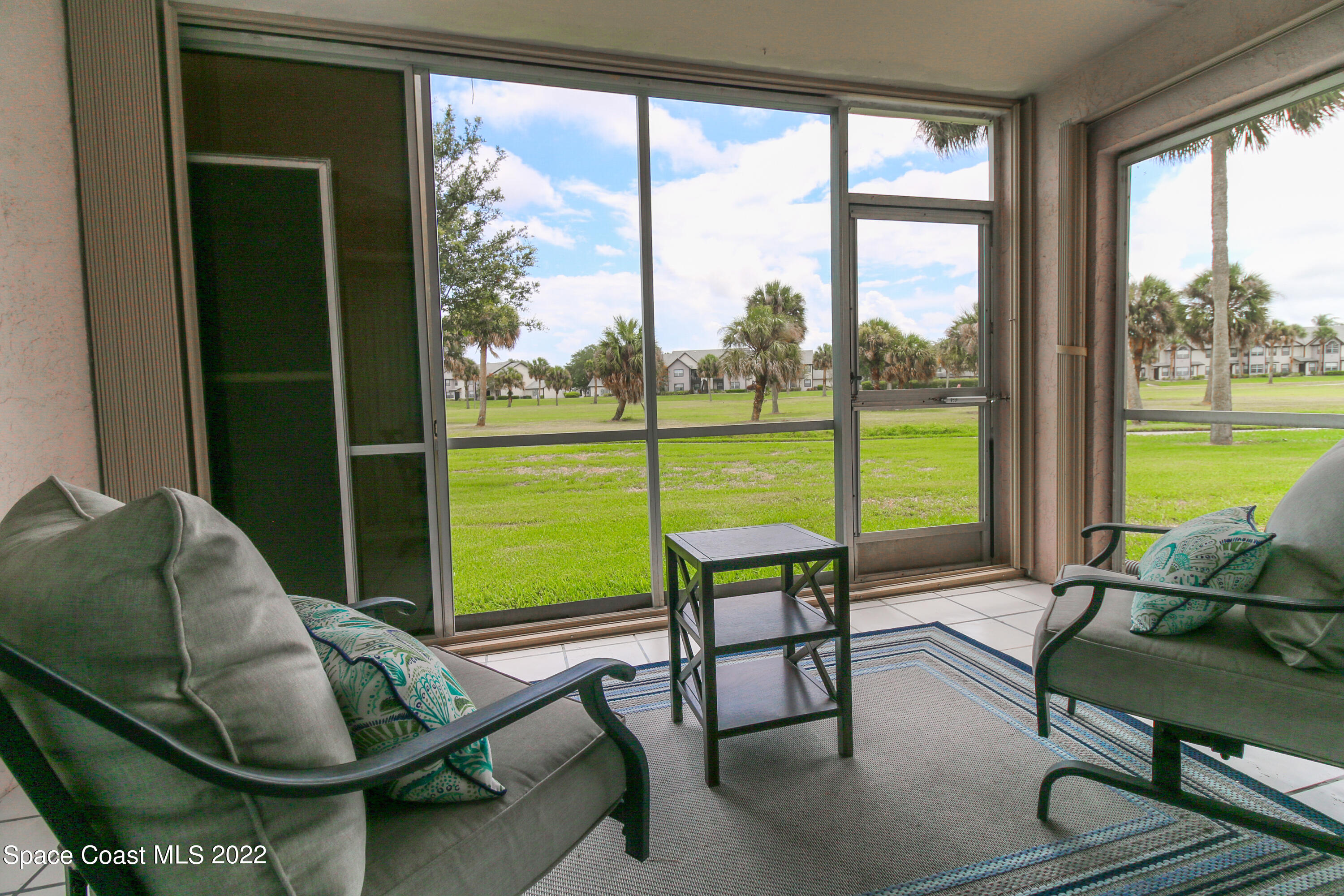 2727 North Wickham Road, Unit 1044 Melbourne, FL 32935 - Photo 13 of 24 Back Porch View 1