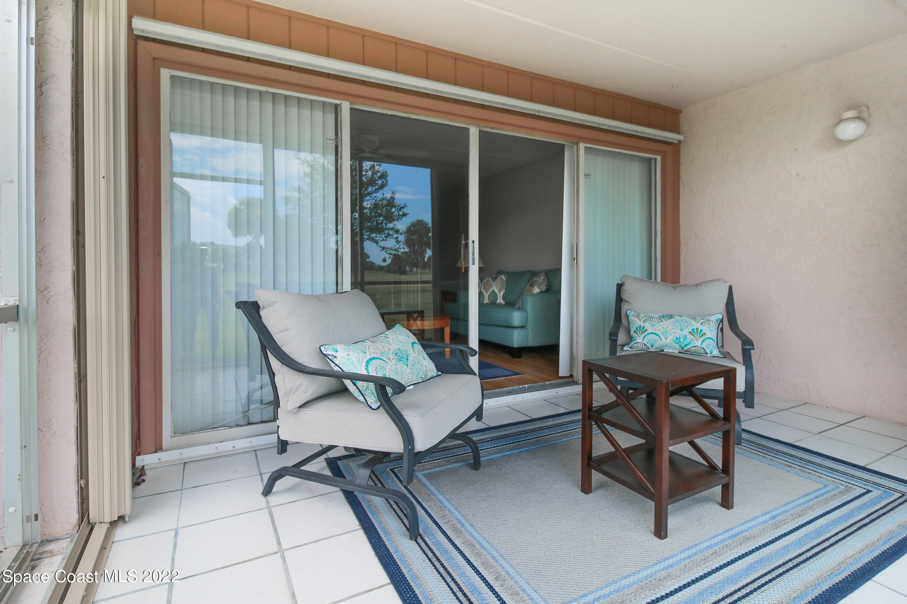 2727 North Wickham Road, Unit 1044 Melbourne, FL 32935 - Photo 14 of 24 Porch pic 1
