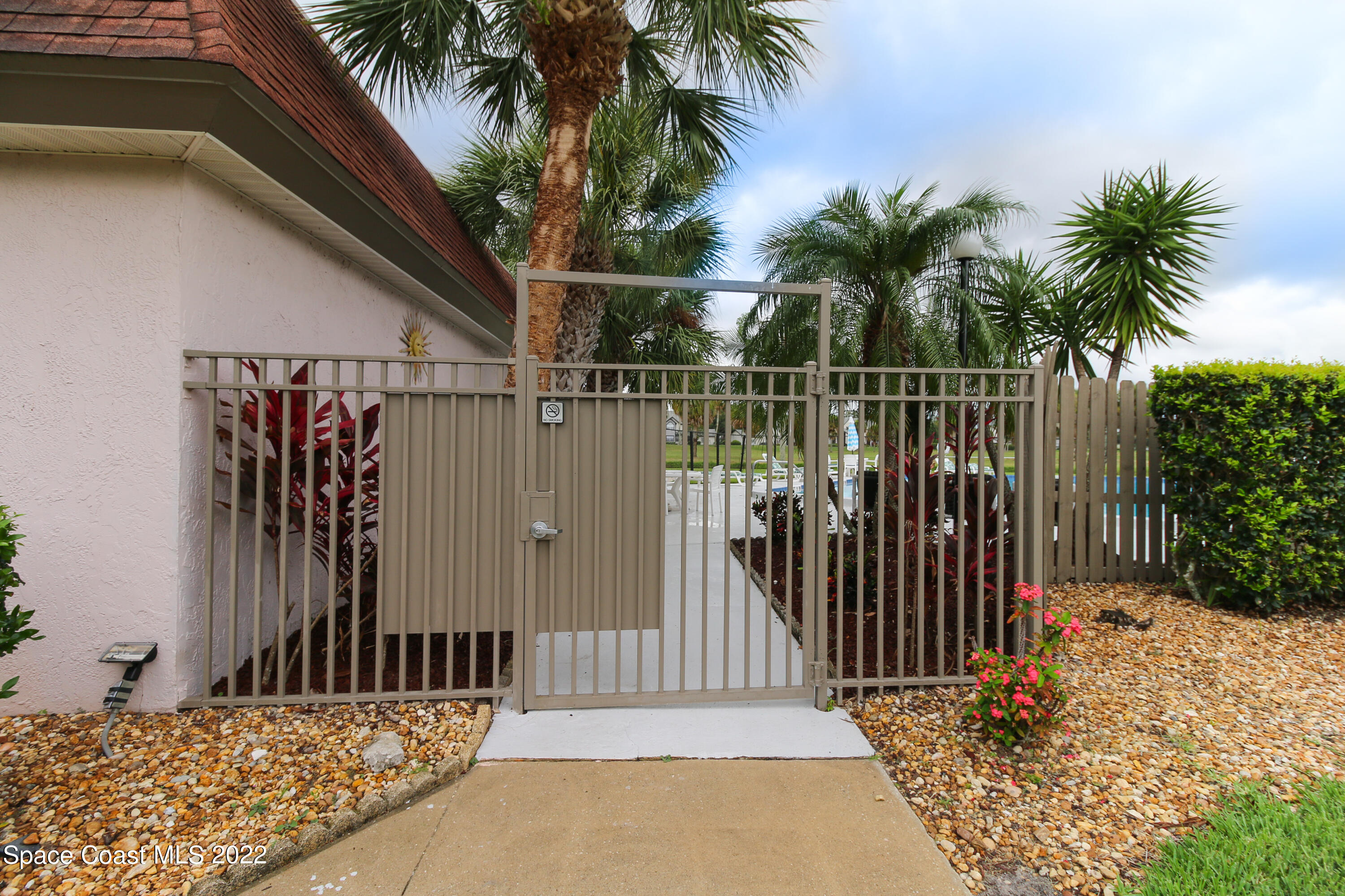 2727 North Wickham Road, Unit 1044 Melbourne, FL 32935 - Photo 19 of 24 Pool Gate