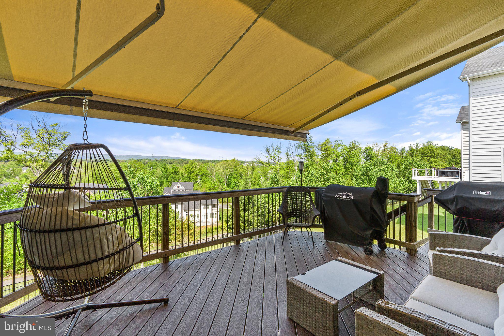 25849 Racing Sun Drive Aldie, VA 20105 - Photo 50 of 80 Retractable awning off deck