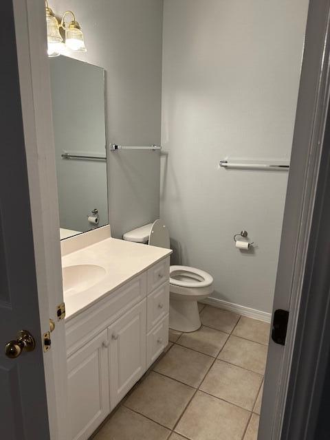 1501 Partin Drive North, Unit 164 Niceville, FL 32578 - Photo 20 of 23 a bathroom with a granite countertop toilet and a shower