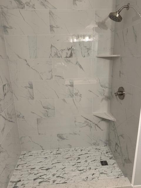 1501 Partin Drive North, Unit 164 Niceville, FL 32578 - Photo 21 of 23 a bathroom with a shower