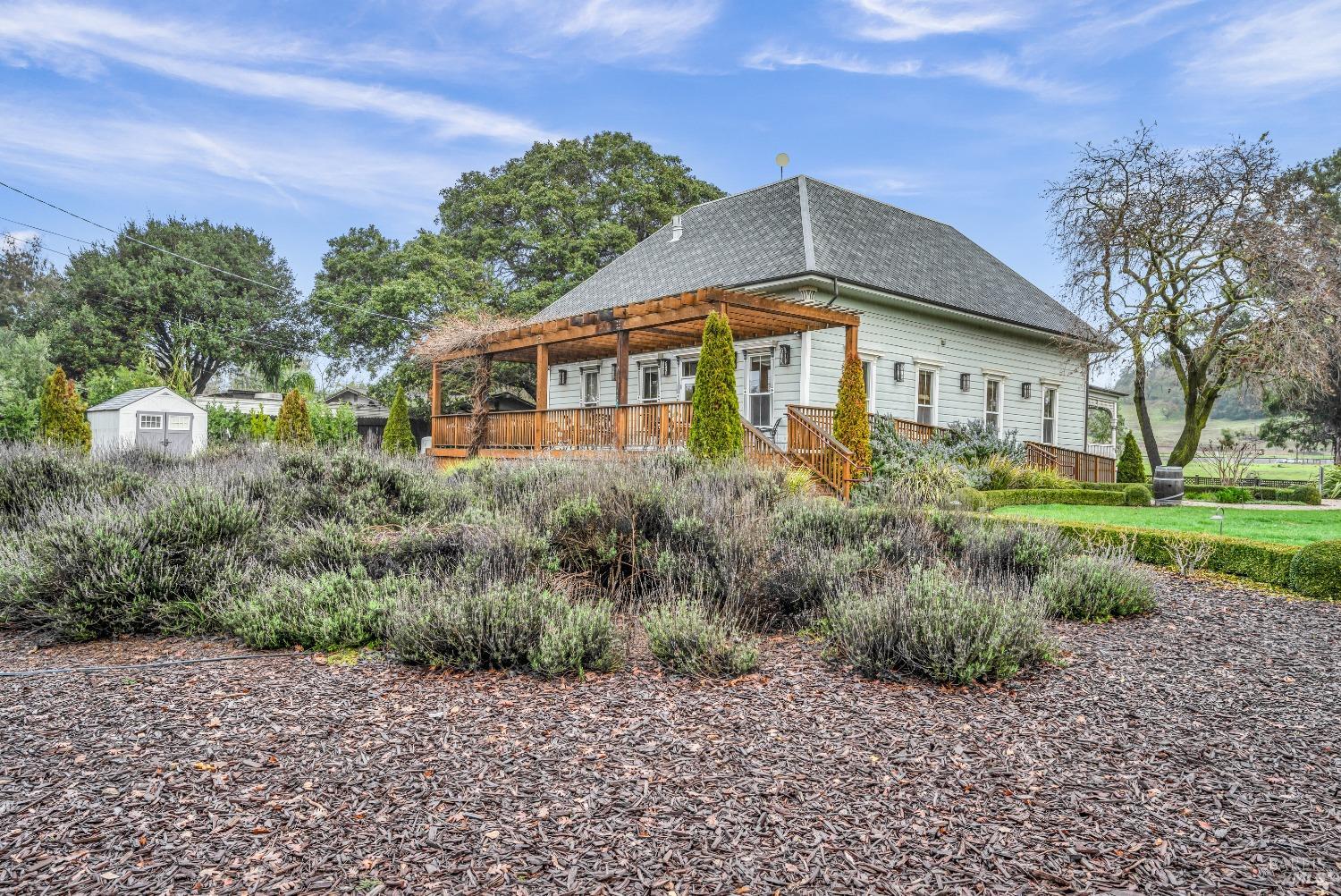 129 Devlin Road Napa, CA 94558 - Photo 14 of 38 a front view of a house with a yard