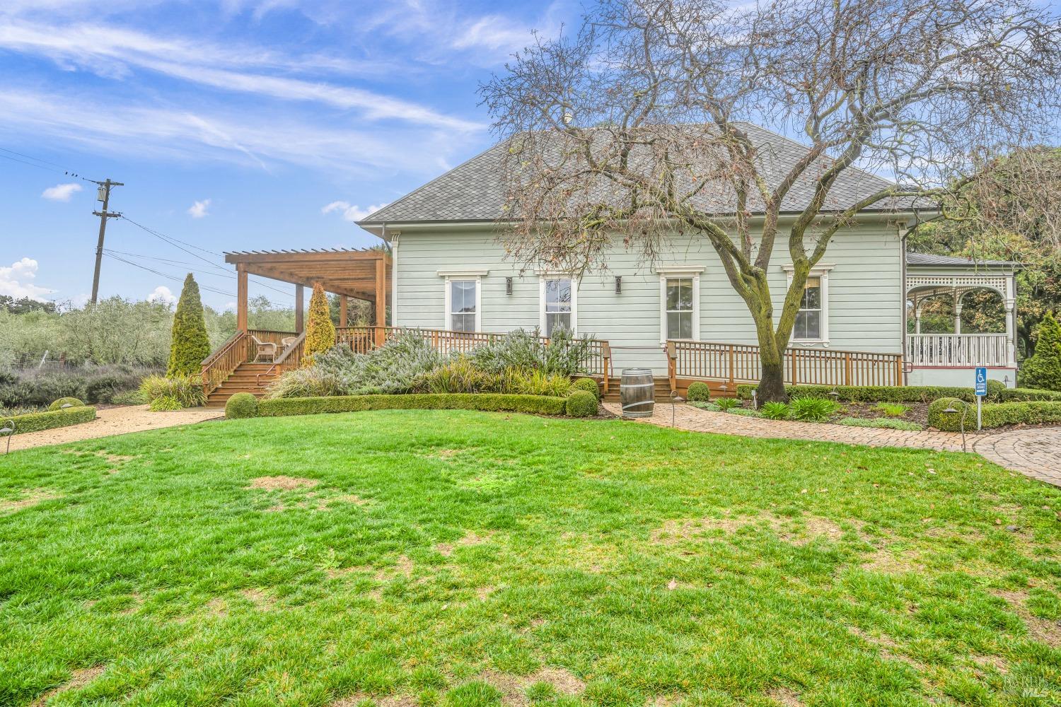 129 Devlin Road Napa, CA 94558 - Photo 17 of 38 a front view of house with yard and green space