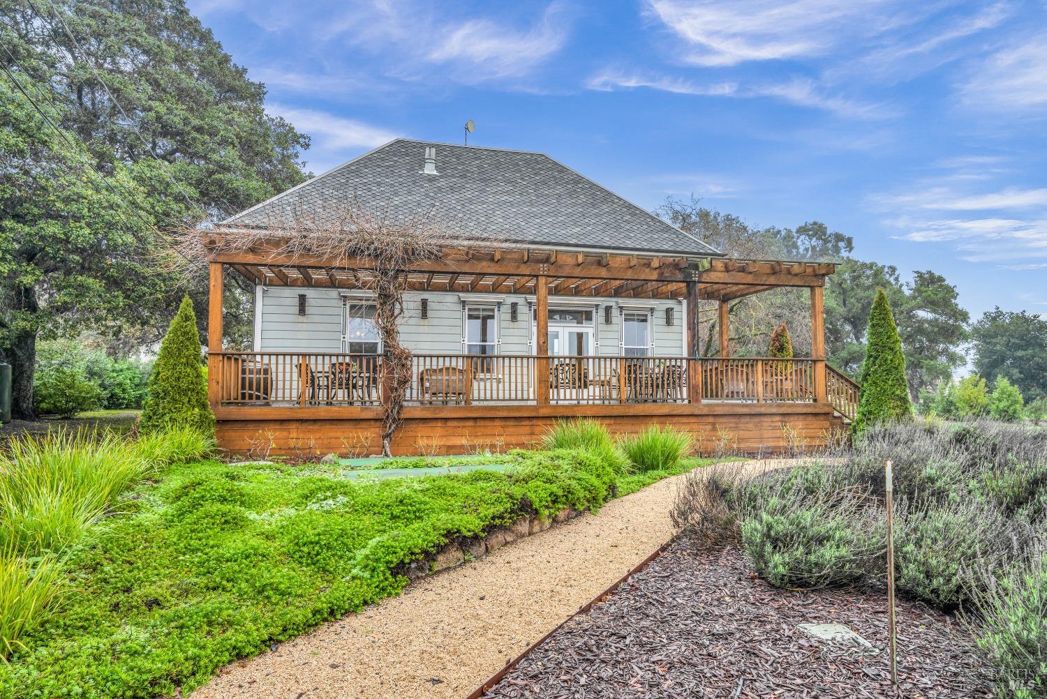 129 Devlin Road Napa, CA 94558 - Photo 19 of 38 a front view of a house with a yard