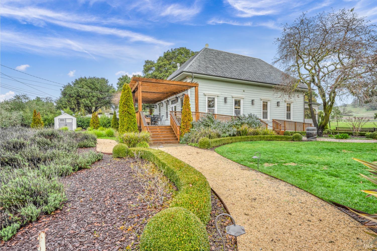 129 Devlin Road Napa, CA 94558 - Photo 20 of 38 a front view of a house with a yard
