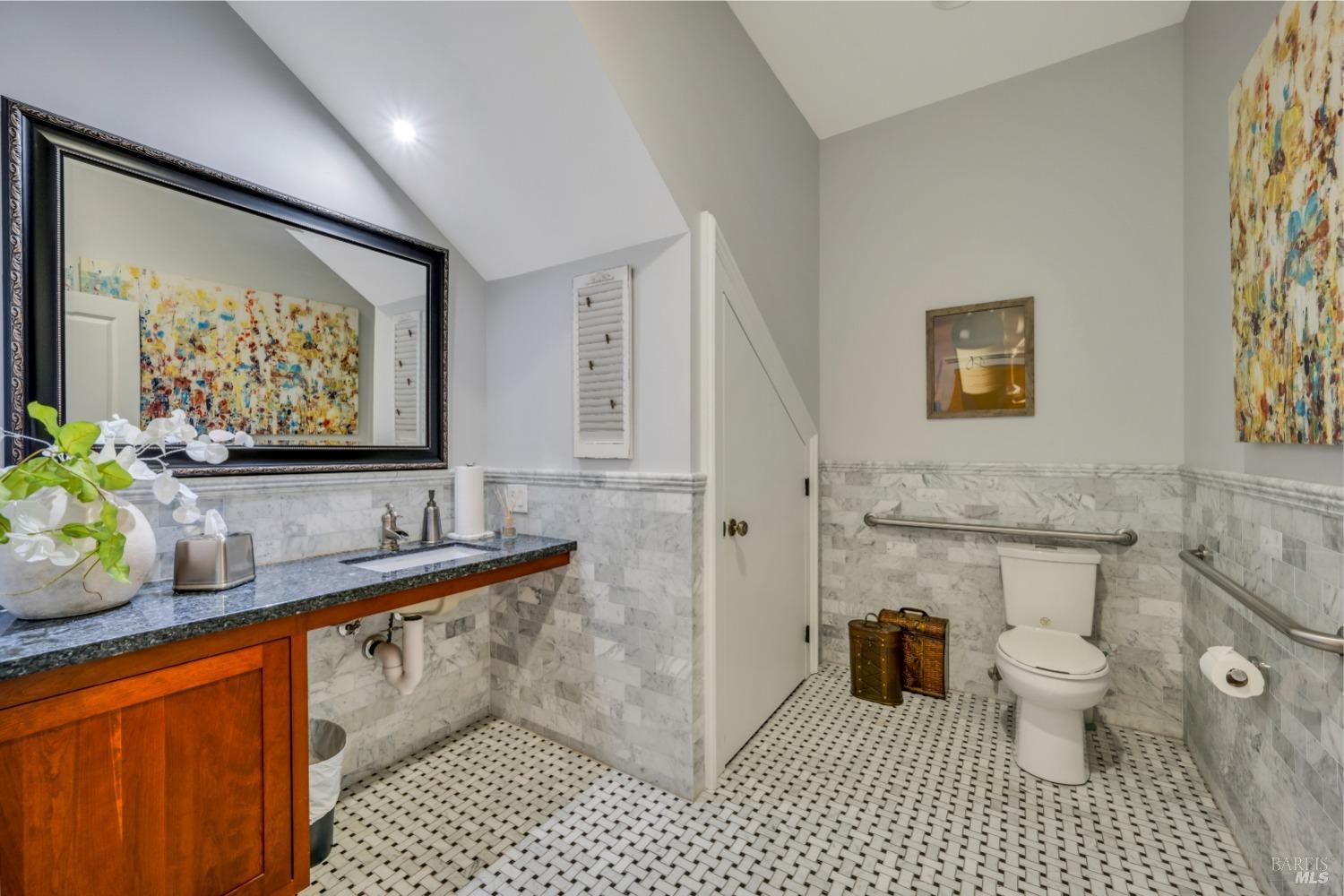 129 Devlin Road Napa, CA 94558 - Photo 25 of 38 a bathroom with a sink a toilet and a shower