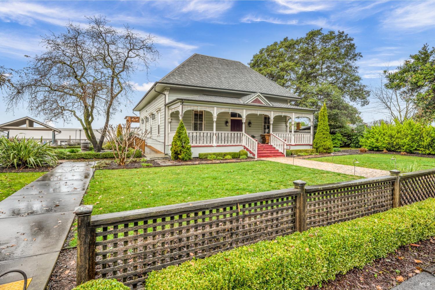 129 Devlin Road Napa, CA 94558 - Photo 38 of 38 a view of a house with a yard and flower plants