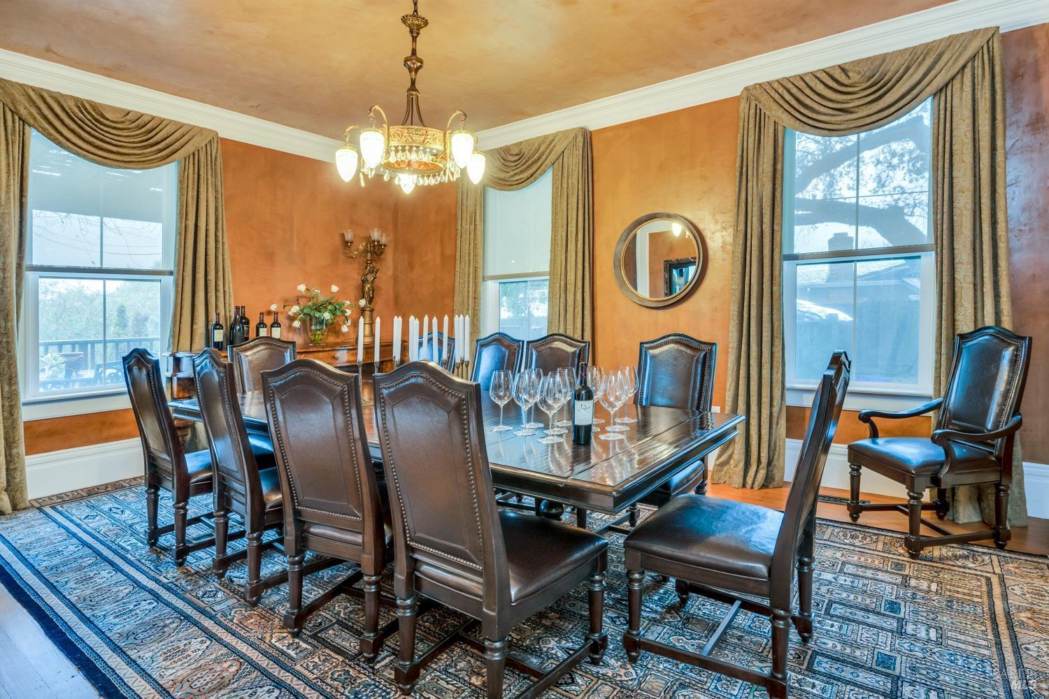 129 Devlin Road Napa, CA 94558 - Photo 5 of 38 a view of a dining room with furniture wooden floor and chandelier