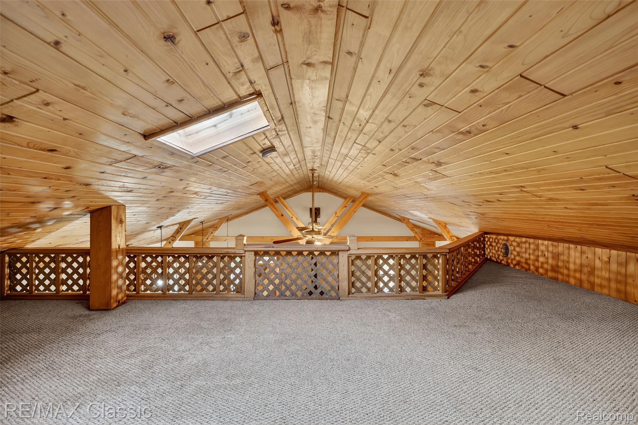 4611 Murray Road Mayville, MI 48744 - Photo 43 of 50 Loft area is perfect for a kids playroom - access through the pull-down ladder in hallway