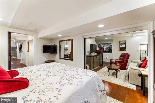 a bedroom with a bed and furniture