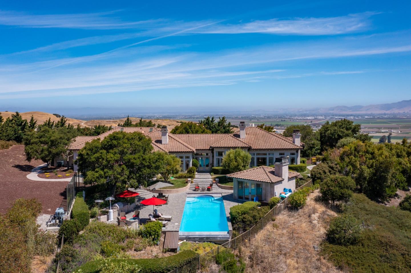 an aerial view of a house with a garden