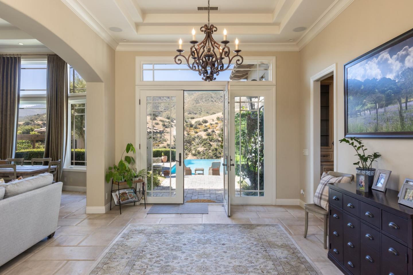 19831 Spring Ridge Terrace Salinas, CA 93908 - Photo 11 of 49 a living room with furniture and a chandelier