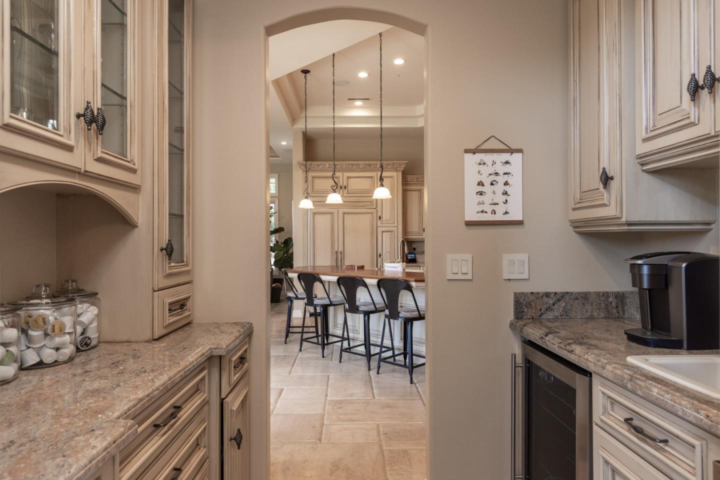 19831 Spring Ridge Terrace Salinas, CA 93908 - Photo 12 of 49 a kitchen with granite countertop a sink cabinets and stainless steel appliances