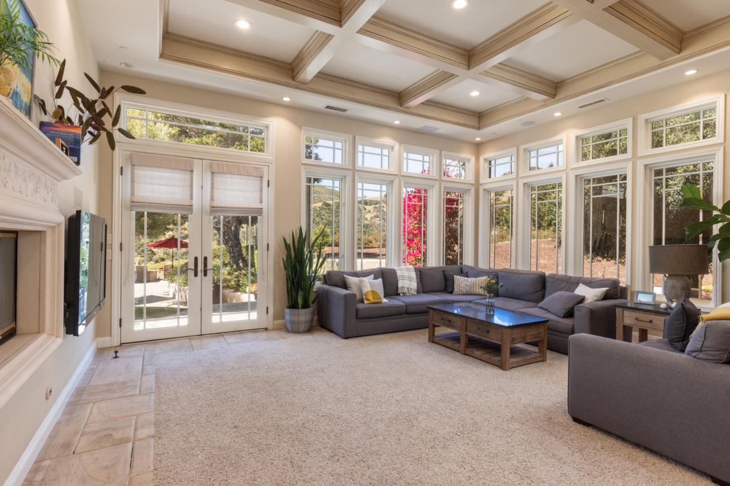 19831 Spring Ridge Terrace Salinas, CA 93908 - Photo 15 of 49 a living room with furniture and a floor to ceiling window