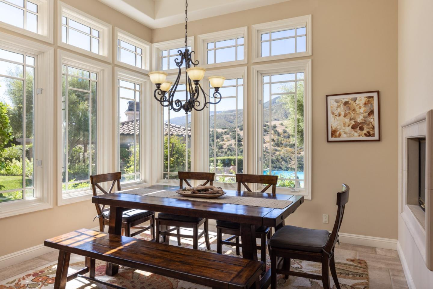 19831 Spring Ridge Terrace Salinas, CA 93908 - Photo 16 of 49 a view of a dining room with furniture large windows and wooden floor
