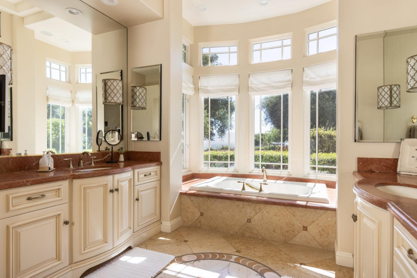 19831 Spring Ridge Terrace Salinas, CA 93908 - Photo 19 of 49 a large bathroom with double vanity and a large mirror