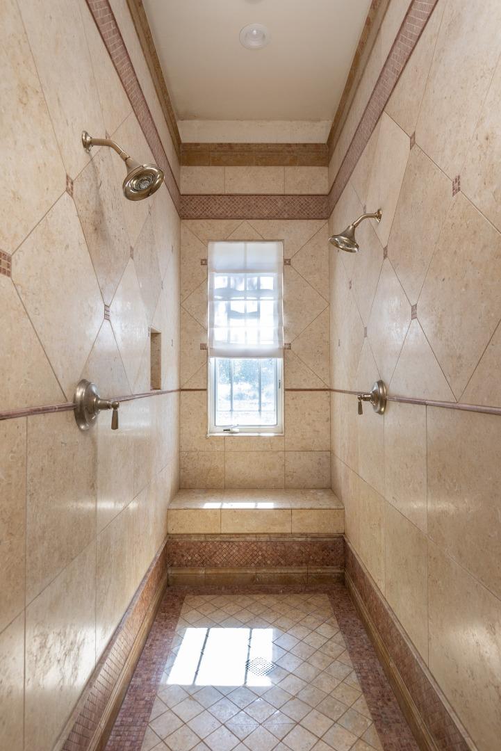 19831 Spring Ridge Terrace Salinas, CA 93908 - Photo 20 of 49 a bathroom with a bathtub and a shower