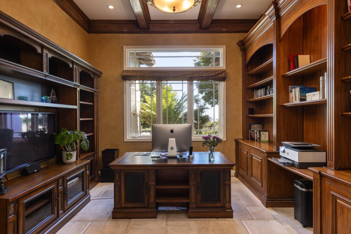 19831 Spring Ridge Terrace Salinas, CA 93908 - Photo 21 of 49 a living room with furniture a flat screen tv and a floor to ceiling window